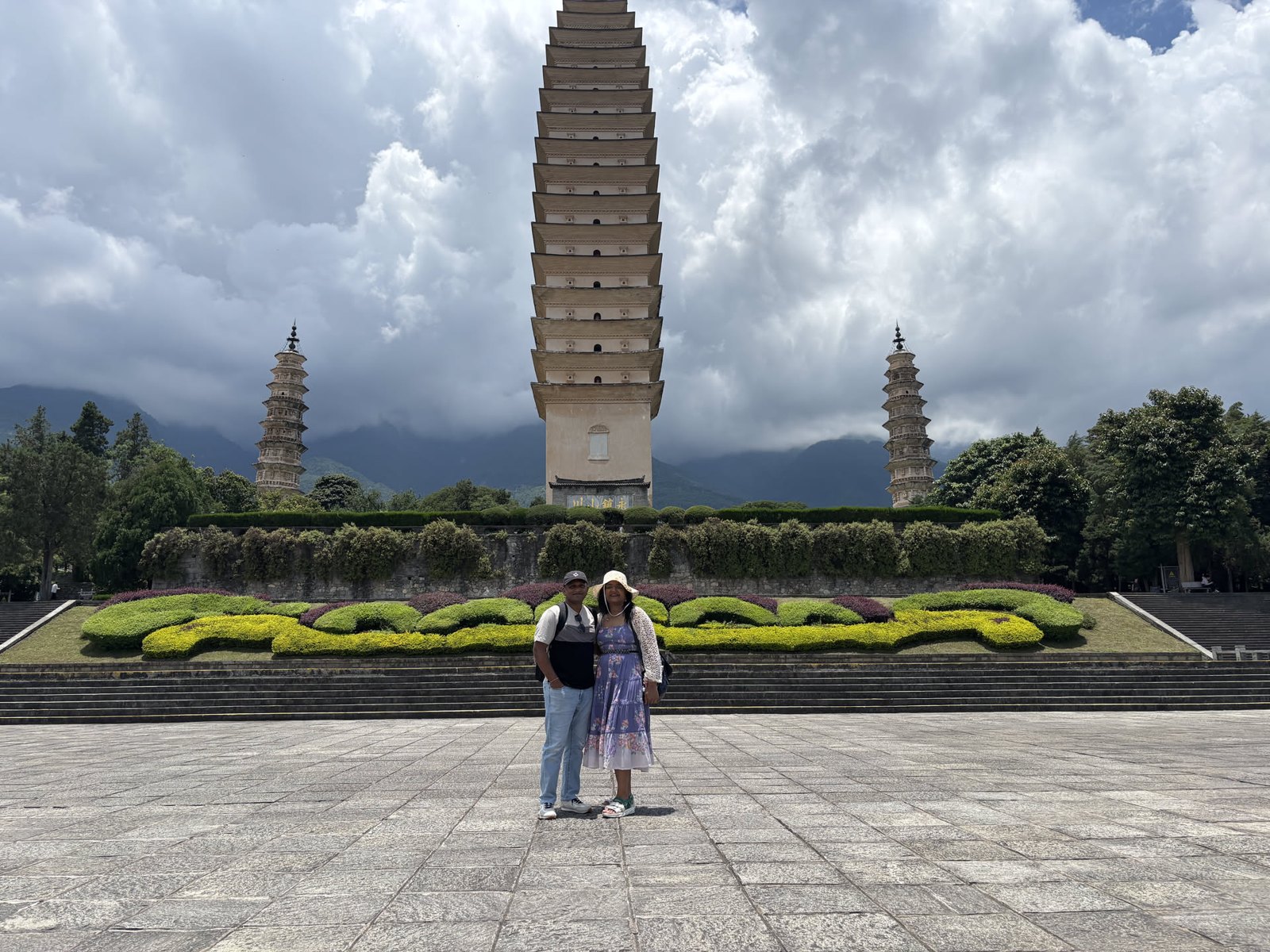 The Three Pagodas behind us, a thousand-year backdrop for a ten-year love